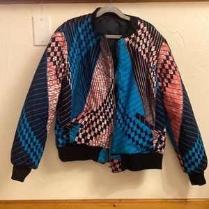 Reversible blue and pink African print bomber jacket